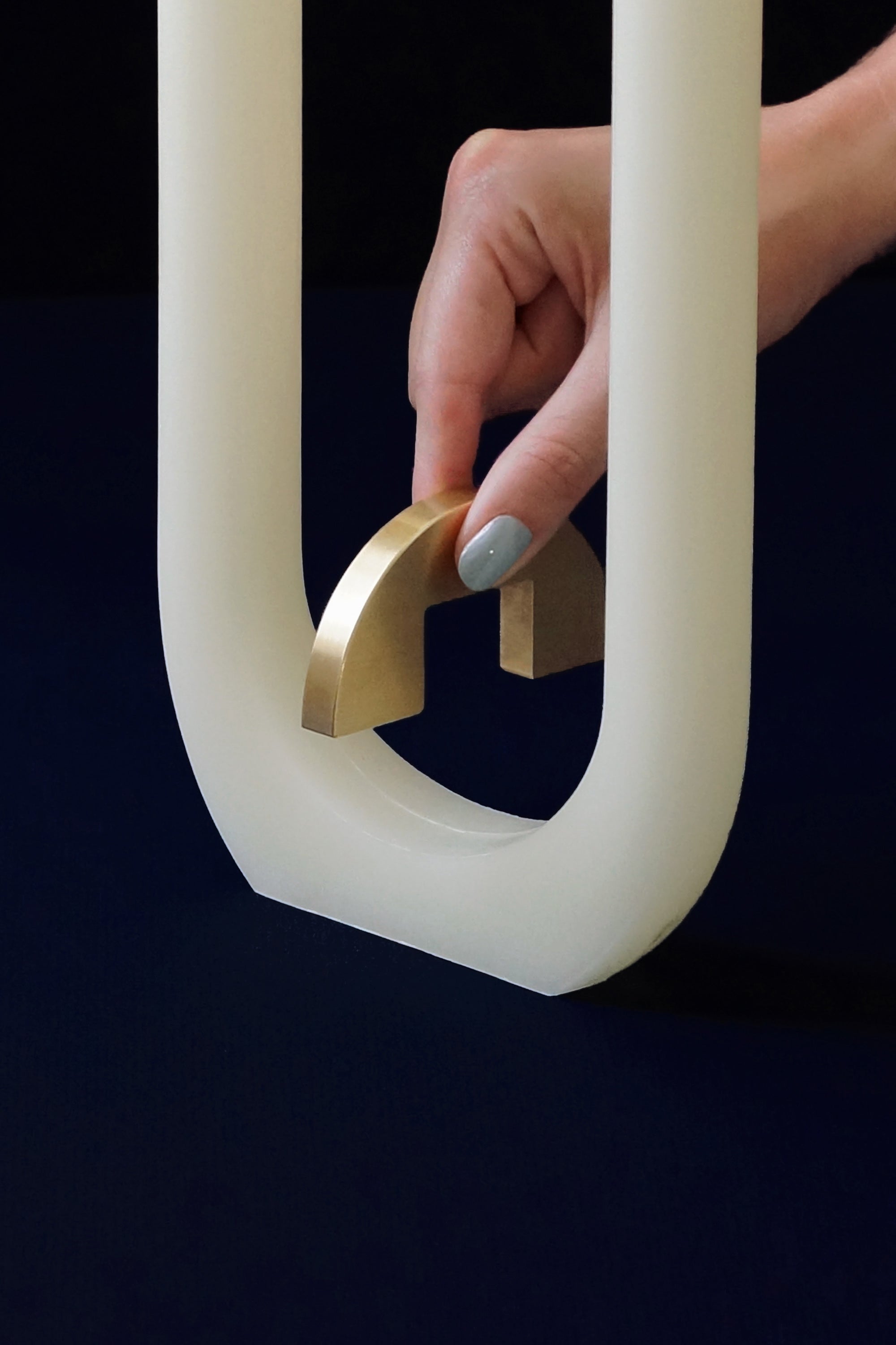 ivory u candle with brass holder