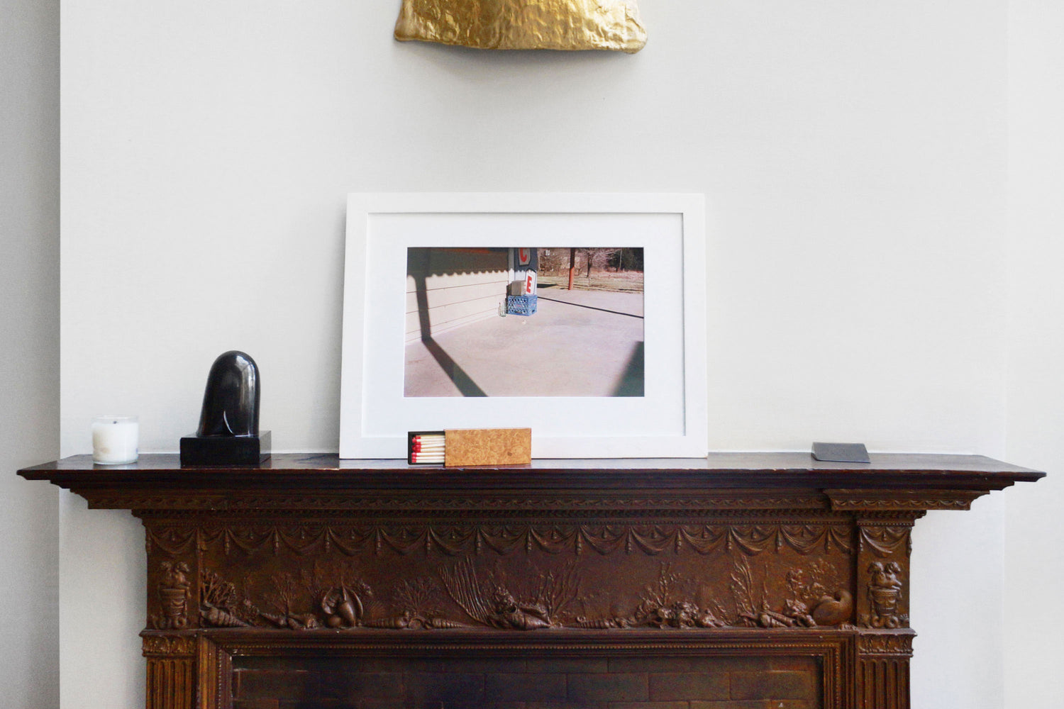 maple burl matchbox on mantel